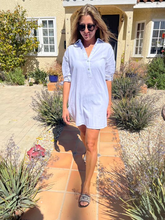 Secret Language's 'Sherv' mini dress is cut from lightweight cotton that'll flutter beautifully in a summer breeze. It's cut for a loose and its sleeves threaded with adjustable ties. Wear yours with strappy sandals.